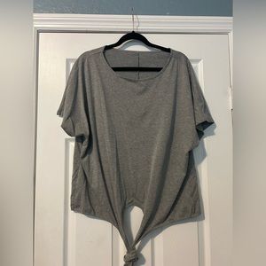 Gray shirt with built in waist tie.